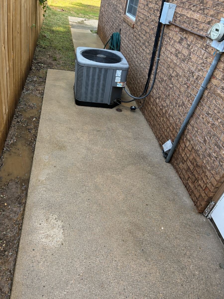 After: drainage trench along the fence and a clean concrete walkway
